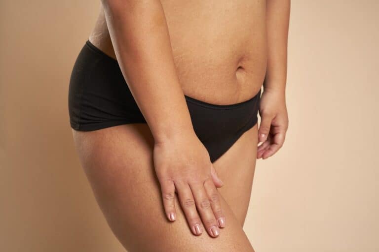 woman posing in black underwear